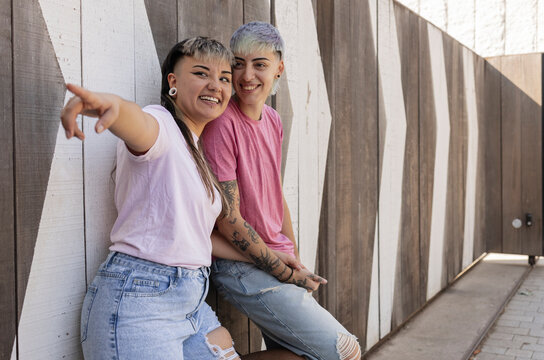 Lesbian couple enjoying a playful moment together