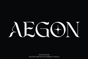 Fototapeta premium Unique elegant decorative serif alphabet display font vector. Curvy trendy typeface