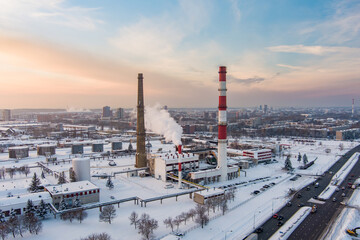 Aerial view of biofuel boiler-house plant facilities with steaming chimneys on winter day in Klaipeda, Lithuania