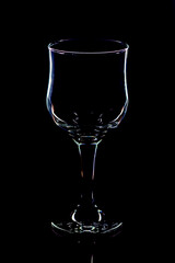 elegant galss of red wine on black background