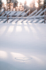 Snow Cover with a Heart in the Sunlight