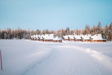 Glass Igloos to Watch Northern Lights Covered with Snow in the Forest