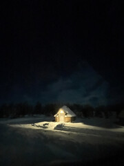 Sole Snow Covered Igloo Lit Up in the Dark Night