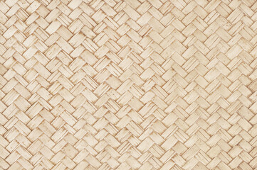 Old bamboo weaving pattern, woven rattan mat texture for background and design art work.