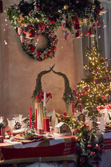 Christmas table setting indoors Christmas decoration in classic red and gold color scheme