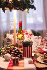 Christmas table setting indoors Christmas decoration in classic red and gold color scheme