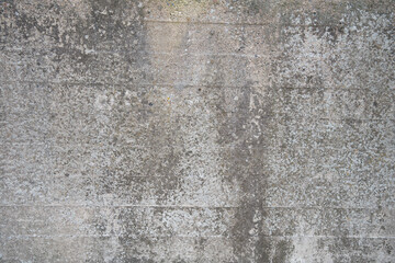 Weathered dirty gray concrete wall. Abstract background for construction and architecture with space for text.