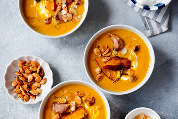 Creamy baked pumpkin soup with pumpkin seeds and almonds .style hugge