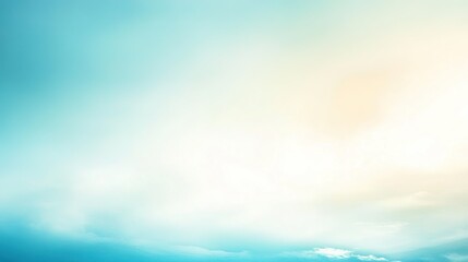 Fototapeta premium A serene sky at dawn with soft blue and golden hues over rolling clouds creating a tranquil atmosphere during early morning hours
