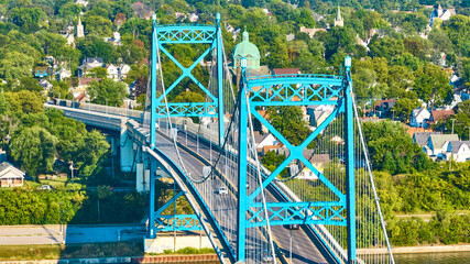 Aerial Zoom of Blue Suspension Bridge Over Maumee River Toledo