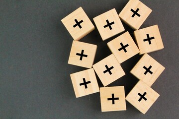 group of plus or positive symbols. Added value or increasing benefits concept. Progress and profit...