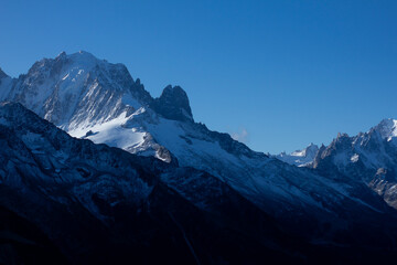 Fototapeta premium Snowy mountain heights in the morning, mountain landscape of the Alps