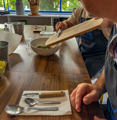 Particpating in a greek cooking class