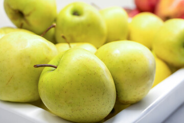 Ripe Apples on a White Tray - Side View