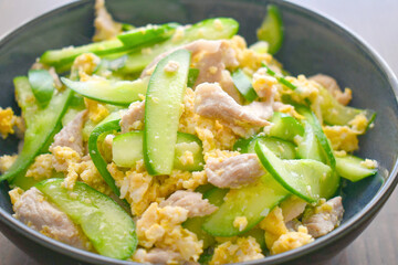 Cucumber stir fry with egg and pork. Asian food. Thai style dishes.