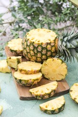 Pineapple, sliced into half rings close up