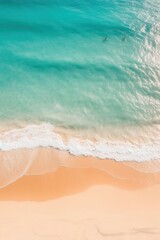 Azure Serenity: An aerial perspective of turquoise waves kissing the pristine golden shores, inviting you to escape to paradise. 