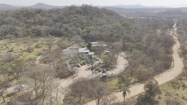 Drone does 360 around welcome center to Gruta do Mimoso near Bonito, Mato Grosso do Sul, Brazil