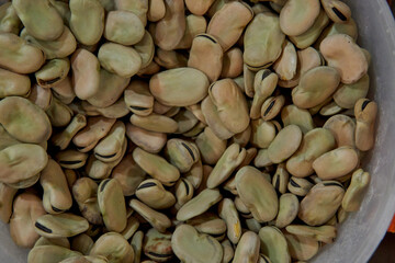 Pile of dried organic  broad beans, background