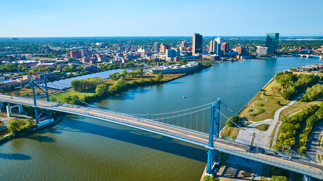 Aerial View of Blue Suspension Bridge and Toledo Skyline Over Maumee River
