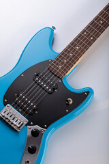 Obraz premium Close-up of blue electric guitar steel strings. Close-up image. Studio shot. 