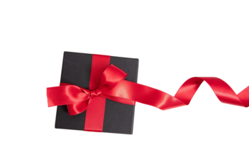 Black Friday Sale. Black gift box with red ribbon bow isolated on white transparent, top view