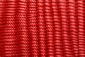 Close-up of red woven fabric texture with soft fuzzy feel