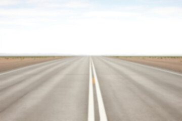 Naklejka premium Blurred countryside road backdrop