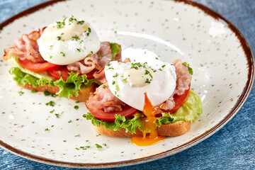 poached eggs on the toasts