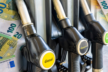 refuel station close up with three refueling dispensers of petrol and diesel on gas station. modern...