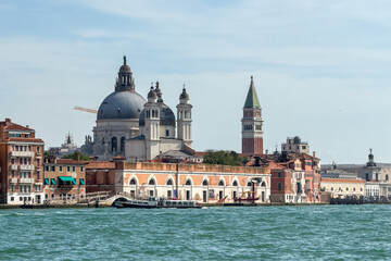 Naklejka premium Venice landscape photo from boat. Sunny summer day in Venice, view to San Marco Square and other landmark buildings. Travel to Italy.