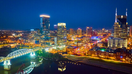Aerial Nashville Skyline at Night Over Cumberland River