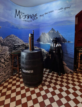 KILLARNEY, IRELAND - JUNE 03, 2023: The Bridge Bars &lsquo;Pint Pour&rsquo; experience where you even get to take home your own t-shirt like Mark Hamill wore. 