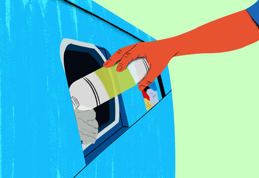Hand pouring liquid detergent into the compartment of a washing machine.