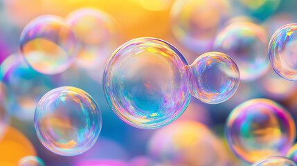 Rainbow soap bubbles on bright colorful background close up