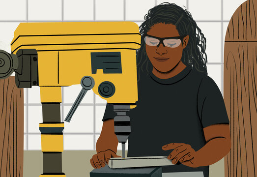 Young woman surveying land with a yellow theodolite instrument on a construction site.