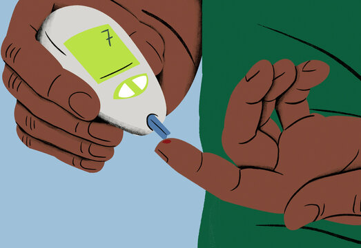 A person uses a glucometer to check their blood sugar levels by pricking their finger.