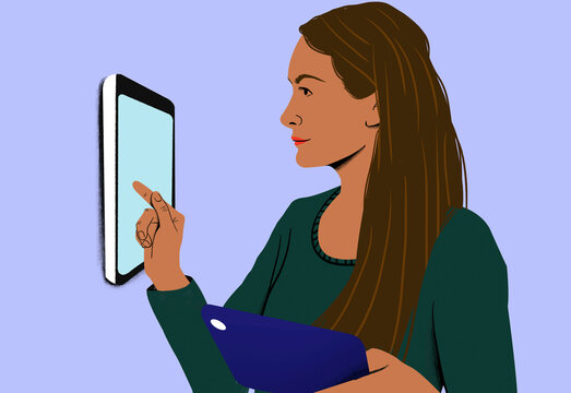 Side profile of a woman with long hair using a digital tablet mounted on a wall.