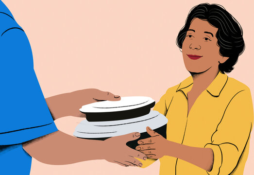 Smiling woman receiving a stack of documents from a person against a pastel background.