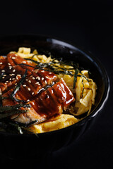 Teriyaki Pork with rice japanese food isolate in black background