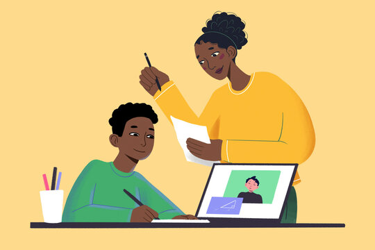 A smiling woman guides a young boy doing schoolwork with a laptop open in front of them on a beige background.
