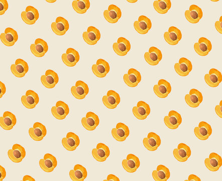 Seamless pattern of apricot fruits on a beige background.