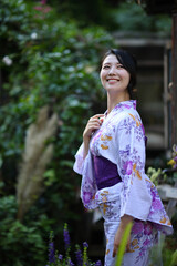 portrait woman with yukata dress in the garden