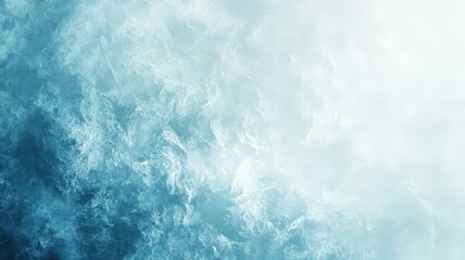 Fototapeta premium Gentle waves lapping against a sandy shore at dawn, with soft hues of blue and white creating a serene coastal atmosphere