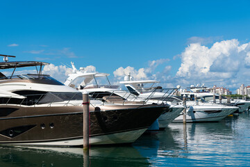 Yacht boat docked on sea Biscayne bay. Downtown Miami Marina with luxury yacht boat. Summer vacation. Luxurious yacht marina. Luxury boat. Marina in Miami Beach, Florida USA. Yacht design