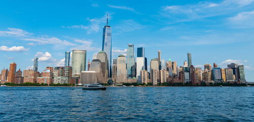 Fototapeta premium Cruise ship York. Skyline of New York Manhattan cruising on the Hudson River cruise liner. New york cruise lines ships vacation