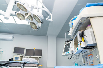 Modern operating room equipment setup. The operating room features advanced surgical equipment,...