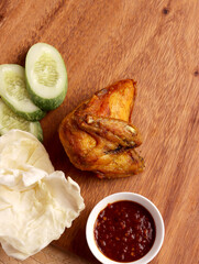 ayam goreng fried chicken indonesian homemade herbs asian plate cooking nasi food wood culinary hot