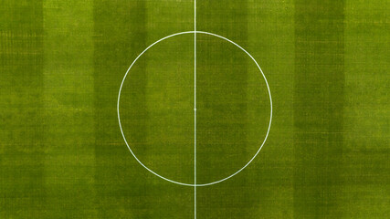 Aerial zenithal view on the center of a natural grass soccer field. Soccer stadium concept. © Stefano Tammaro