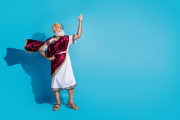Full size photo of powerful mature man raise hand recite poem wear ancient roman emperor tunic...
